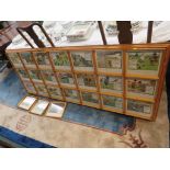 A framed group of twenty-one Rules of Golf reproduction prints after Charles Crombie, mounted in a