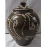 Gourd shape studio pottery jar and lid with an abstract design in olive green glaze, height 22cm