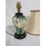 Moorcroft pottery baluster table lamp, green ground graduation to cream, tube lined decoration of