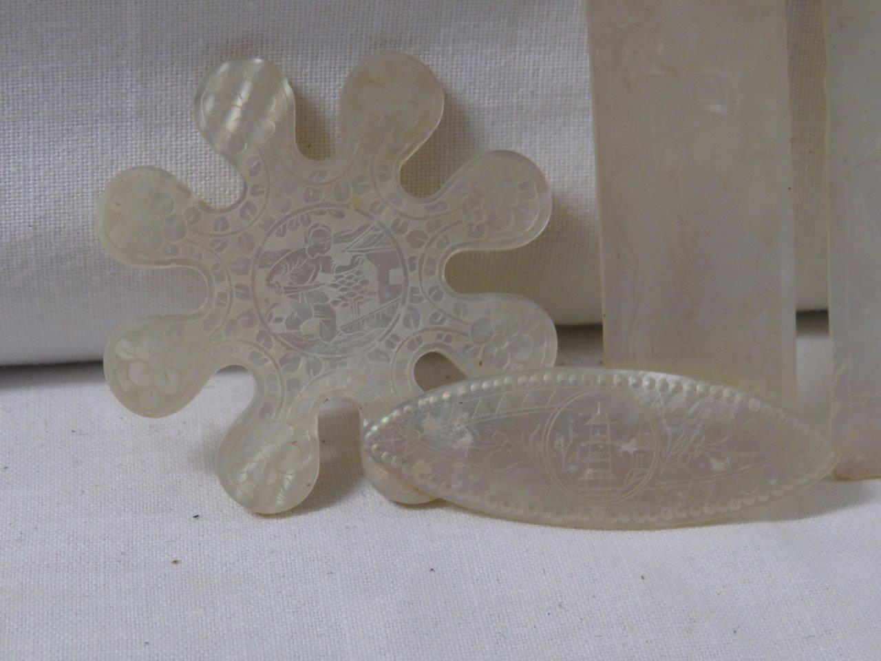 About twenty-five assorted mother of pearl gaming counters of various shapes, fish, circular, - Image 2 of 3