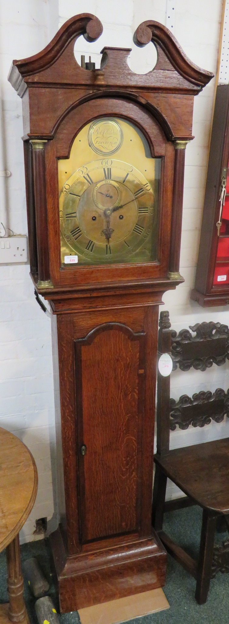 An early 19th century oak cased eight day chiming Grandfather clock by Robert Clidsdale of