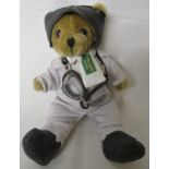 Brooklands Museum Bertie plush bear dressed in white racing overalls, scarf, helmet and goggles,