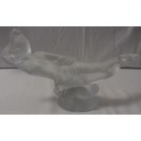 Desna opaque glass mascot modelled as a recumbent semi-nude woman, height 16.5cm, length 31cm,