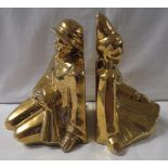 A pair of Edition Kaza Claris Levy figural pottery bookends modelled as a seated man and woman,