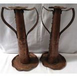 A pair of Newlyn Arts and Crafts copper candlesticks, cylindrical tapering form with raised