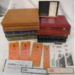 Three unused stock albums and two unused stamp albums, together with two tan stock albums, unused