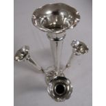 Silver four-stem epergne on a stepped circular foot, height 25cm, filled base, marks for Chester,