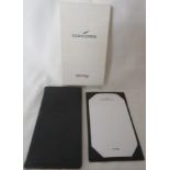 British Airways Concorde address book bound in dark grey leather and embossed with the logos, and