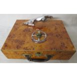 Jaguar Driver's club carry case in a faux burr walnut finish, mounted with bonnet mascot and