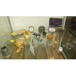 SHELF OF DECORATIVE METAL ITEMS INCLUDING SILVER HALLMARKED CAT, BRONZE BOAR, SILVER NAPKIN RINGS,