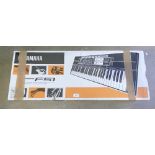 A Yamaha PSR-F51 Digital/Electrical Keyboard.