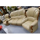 A beige leather 3 piece suit comprising of a 3 seater settee and 2 arm chair (3)