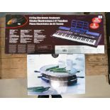 Boxed 61 key Power play electronic keyboard together with M&S classic stone raclette(2)