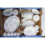 A collection of Minton Haddon Hall design dinner ware to include dinner plates, serving platters,