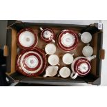 A mixed collection of Meakin tea and dinner ware with burgandy and gilt decoration in the Sol
