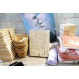 A mixed collection of cosmetic household items to include wicker baskets, handing rack, cushions,