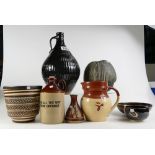 A collection of vintage studio art pottery including large stoneware bottle flask,