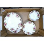 A collection of Royal Albert Old Country Rose items to include serving platters, dinner plates,
