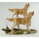 Royal Doulton Labrador on wooden plinth and similar item on resin plinth (2)