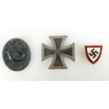 A collection of German military badges to include 1939 Iron Cross,