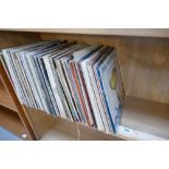 A large collection of 70's and 80's easy listening lps together with similar Moog related lps