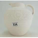 Brentleigh ware matt white jug with a decorative border going around.