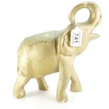 Vintage pottery shop model of a gold elephant advertising Old Holborn,