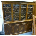 Walnut Astral glazed display cabinet with four doors above four doors to base.