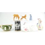 A collection of pottery to include Royal Doulton figure Babie (seconds), Beswick pair comical pigs,