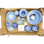 A collection of Wedgwood light blue jasperware including ladies compact, trinket boxes, large bowl,