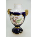 A hand painted limited edition of one hundred Caverswall Robin Urn