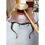 A twentieth century mahogany occasional table with shaped top on cabriole legs and a brass bed pan