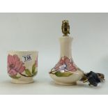 A Moorcroft lamp base and matching jar.