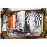 A mixed collection of hard back and soft back books on war related themes