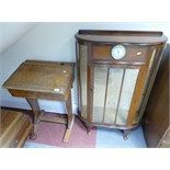 Art deco 1920's demilune walnut single door display cabinet with encased Smiths clock