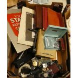 A mixed collection of collectable items to include advertising posters, Rotary and Roamer watches,