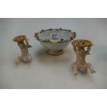 A Dresden flower encrusted bowl and a pair of Sitendorf cherubs