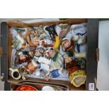 A collection of Royal Doulton charactor jugs, Doulton and Beswick animals ,