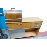 Mid century oak display cabinet with glazed sliding doors and a Singer oak cased sewing machine