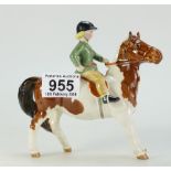 A Beswick girl on a Skewbald Pony,