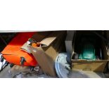 A mixed collection of items to include - Qualcast Lawn mower, Irwin hand saws, a suitcase, shelving,