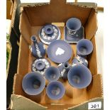 A collection of Wedgwood Queens blue jasper ware to include vases, pin trays,