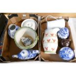 A collection of pottery including a large blue and white tea kettle, blue and white vases,