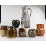 A collection of vintage studio art pottery including Mark Griffith's large jug,