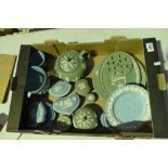 A collection of Wedgwood jasperware items in sage green and blue to include wall plates, teapots,
