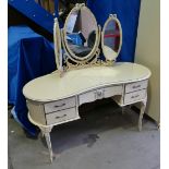 Jarman and Platt white French style triple mirrored kidney shaped dressing table decorated with