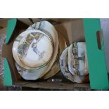 A collection of Royal Doulton Dickens series ware to include plates and dishes,