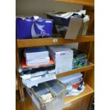 A large mixed collection of office supplies to include - A4 paper, Rhino and Euro office notepads,