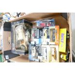 A collection of boxed die cast toys to include Burago Mercedes Benz SSK and other classic car