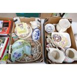 A collection of pottery including Carlson ware, butter dishes, Toby jugs, large jugs,